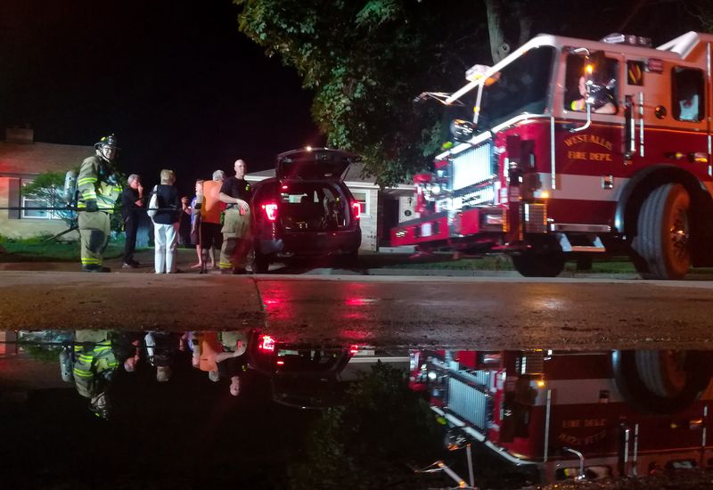The West Allis Fire Department is shown at the scene of a garage fire on West Manitoba Street on Wednesday, June 13, 2018.