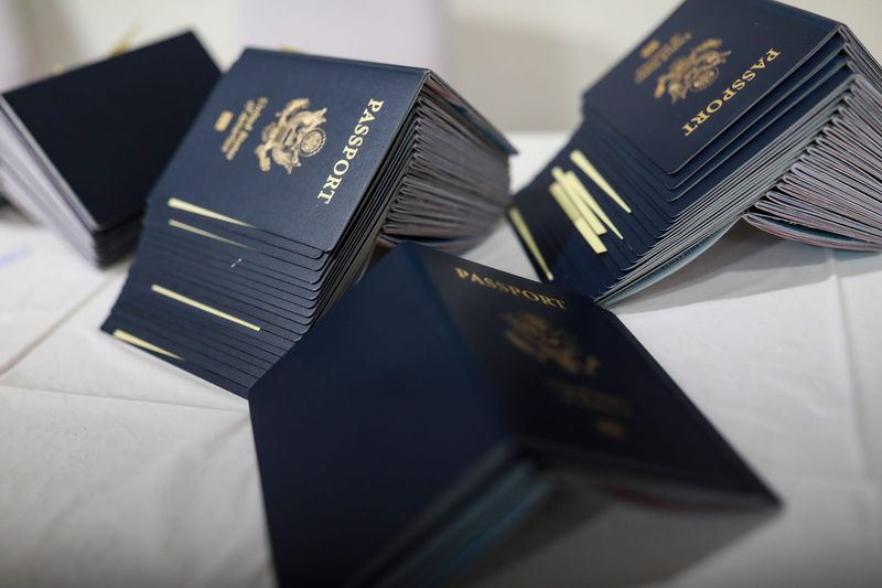 Mohammad Asphakul Numan, the First Secretary (Passport & Visa) for the Embassy of Bangladesh in Washington D.C. processes  around 1,800 passport applications for renewal and No Visa Required at the satellite Bangladesh embassy at the Kabob House Mouchak Sweets restaurant in Hamtramck, Mich. on March 2, 2021.