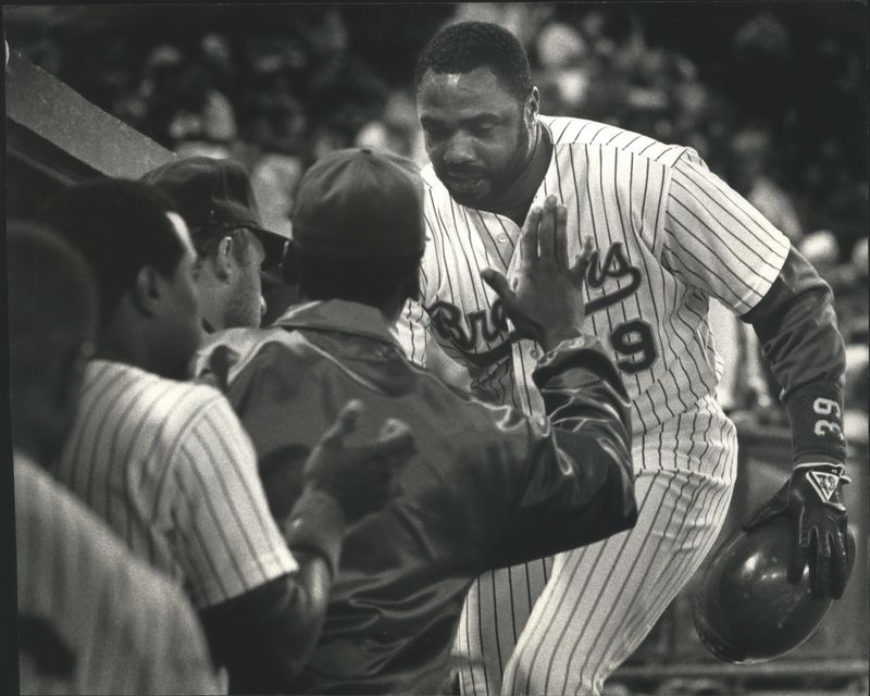 Dave Parker is greeted by Brewers teammates after hitting a two-run homer against Cleveland at County Stadium on June 22, 1990. Parker  spent one season with the Brewers toward the end of his 19-year career in 1990.