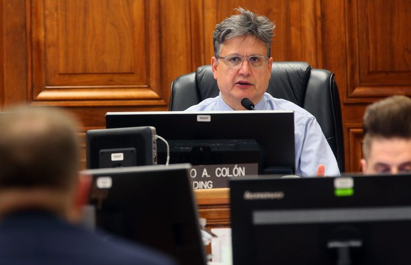 Milwaukee County Circuit Judge Pedro Colón oversees cases at an eviction court hearing  on Jan. 30, 2020.