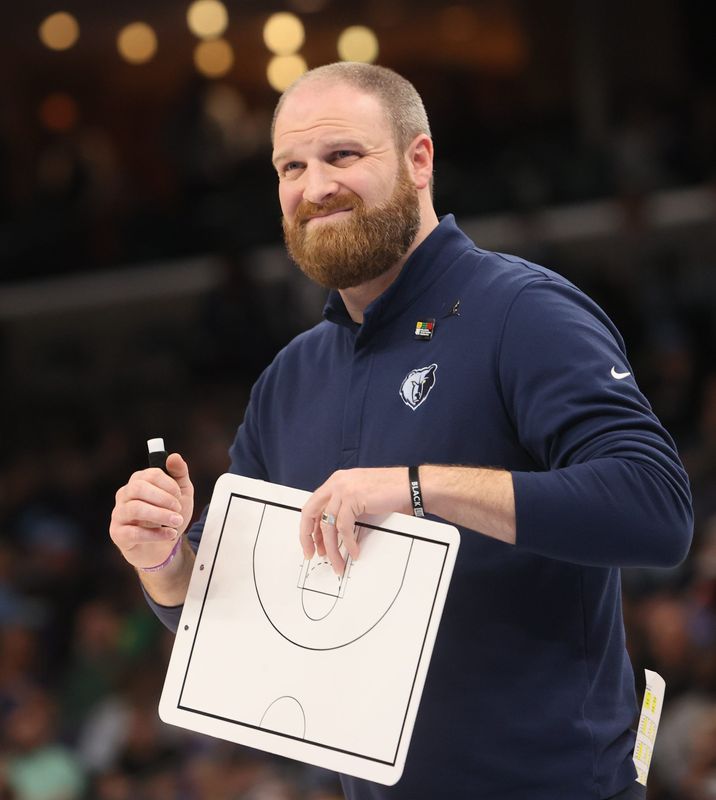 Memphis Grizzlies coach Taylor Jenkins calls a timeout in their game against the Portland Trail Blazers.