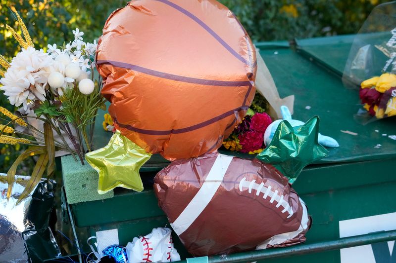 Balloons are included in makeshift memorial on a dumpster near North Hawley Road and West Vliet Street where a 5-year-old Milwaukee boy, Prince McCree, who was found dead last week Thursday. Milwaukee police said they've opened a homicide investigation to determine the circumstances leading to Prince's death.
