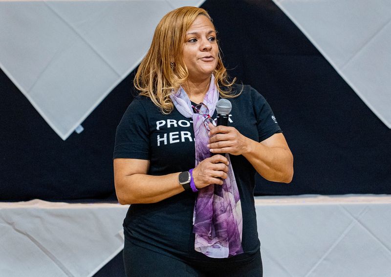 Karin Tyler, Operations Manager for the Office of Community Wellness and Safety, speaks at the Love Without Violence conference on Friday October 20, 2023 in Milwaukee, Wis.