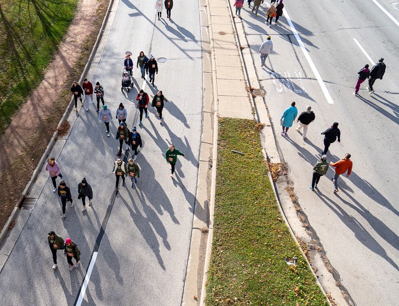 Runners participate in Milwaukee's oldest Thanksgiving Day Turkey Trot at Veterans Park on Thursday November 23, 2023 in Milwaukee, Wis.