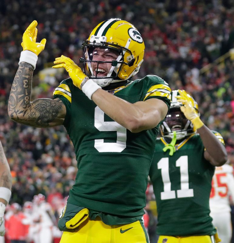 Green Bay Packers wide receiver Christian Watson (9) celebrates scoring a touchdown against the Kansas City Chiefs during their football game Sunday, December 3, 2023, at Lambeau Field in Green Bay, Wis. 
Dan Powers/USA TODAY NETWORK-Wisconsin.