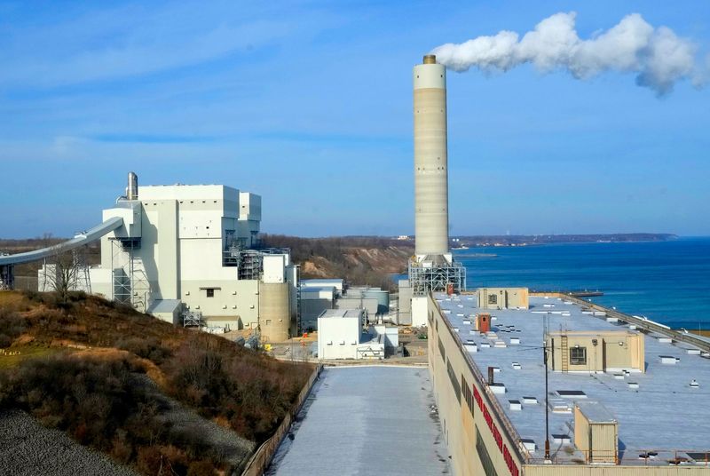 The We Energies Elm Road Generating Station seen from the roof of the Oak Creek Power Plant in Oak Creek on Friday, Dec. 8, 2023. We Energies is moving to shut down the first of four coal-powered generating units at Oak Creek Power Plant in May. The Elm Road plant will be transitioned from coal to natural gas over the next eight years.