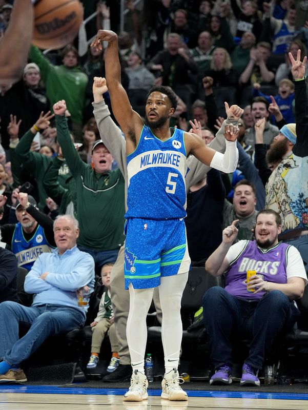 Milwaukee Bucks guard Malik Beasley celebrates his 3-point basket during the second half March 21, 2024 at Fiserv Forum in Milwaukee. The Bucks beat the Brooklyn Nets, 115-108.