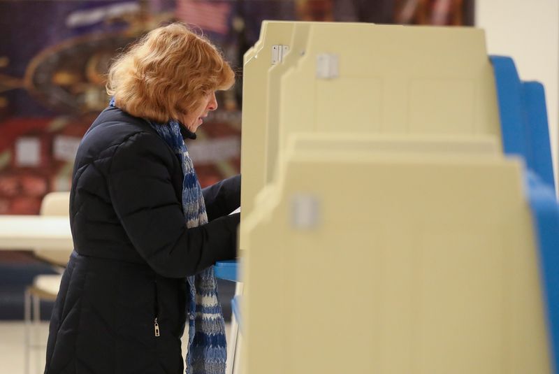 Bobbie Skelly fills out her ballot on Tuesday, April 2, 2024 at First Presbytyrian Church in Green Bay, Wis. Polls for the spring election will remain open until 8 p.m.
