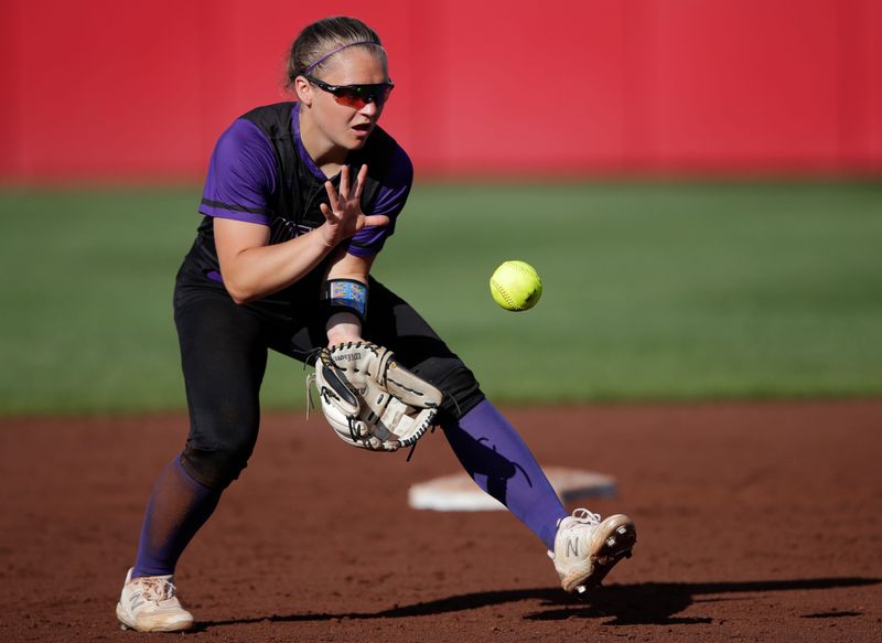 Mosinee High School's Taelyn Jirschele (23) fields a hit against Waupun High School during their WIAA Division 2 championship softball game Saturday, June 08, 2024, at the Goodman Softball Complex in Madison, Wisconsin.
