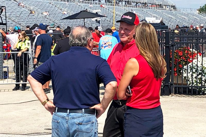 Promoter Bob Sargent, center, talks with Wisconsin State Fair Park board chairman John Yingling and CEO Shari Black before opening ceremonies for the 2024 ARCA and NASCAR Craftsman Truck Series race day at the Milwaukee Mile.