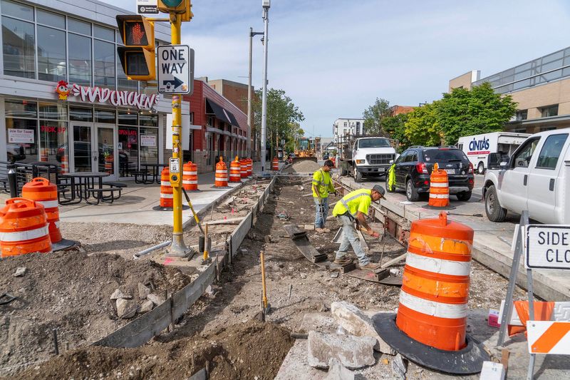Road construction takes place along East North Avenue near North Prospect Avenue in Milwaukee on Friday, Sept. 27, 2024.