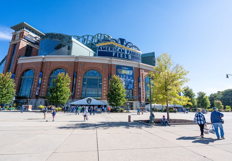Fans walk to American Family Field to watch Game 1 of the wild-card playoff game against the New York Mets on Tuesday October 1, 2024 in Milwaukee, Wis.