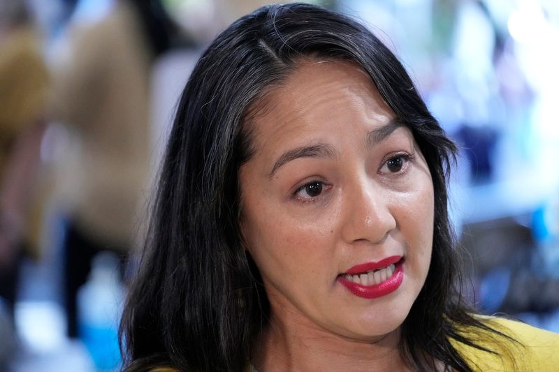Paulina Gutierrez, executive director of the Milwaukee Election Commission, talks to the media at the Zeidler Municipal Building as early voting began in Milwaukee on Tuesday, Oct. 22, 2024.