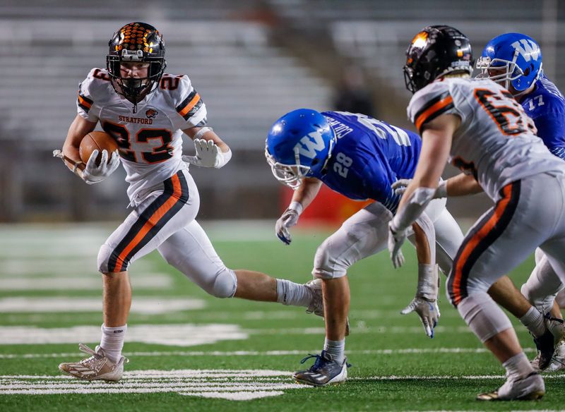 Stratford High School's Brooks Vanderhoof (23) runs the ball against Wrightstown High School during the WIAA Division 5 state championship game on Thursday, November 21, 2024, at Camp Randall Stadium in Madison, Wis. Stratford won the game, 21-6.
Tork Mason/USA TODAY NETWORK-Wisconsin