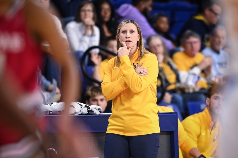 Marquette head coach Cara Consuegra watches her team agaisnt IU Indy in the first half of a game Sunday, November 24, 2024, at the Al McGuire Center in Milwaukee, Wisconsin.