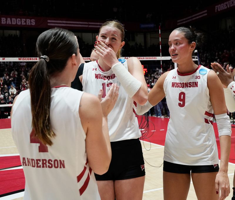 Wisconsin setter Carly Anderson (4), outside hitter Sarah Franklin (13) and middle blocker CC Crawford (9) are seen after their victory against Georgia Tech in the second-round match of the NCAA volleyball playoffs on Friday December 6, 2024 at the UW Field House in Madison, Wis.