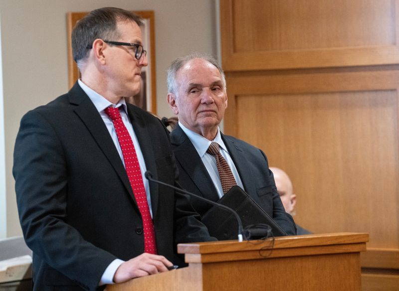 Former Dane County Judge Jim Troupis, right, makes an initial appearance Thursday, December 12, 2024 in Dane County Court in Madison, Wisconsin. He is facing on felony forgery charges stemming from the alleged scheme to forward fake electors in an effort to overturn the 2020 elections. At left is his attorney Joseph Bugni.