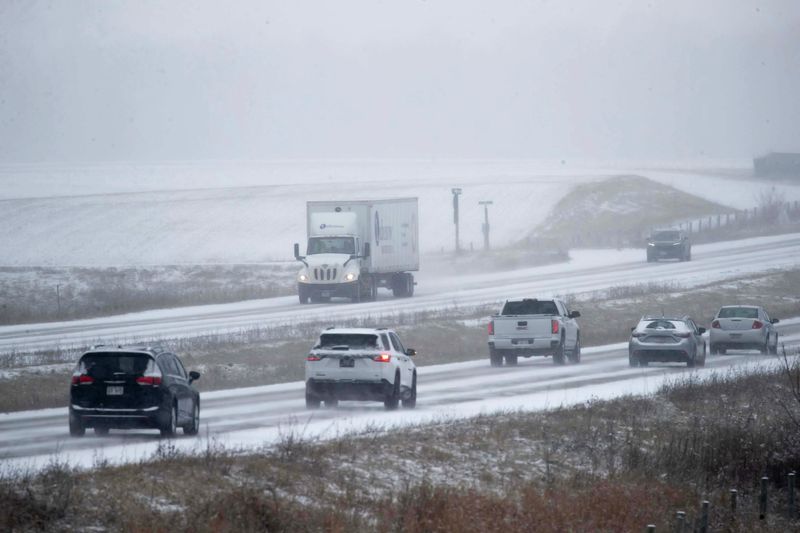Motorists travel on state Highway 23, Thursday, December 19, 2024, near Sheboygan Falls, Wis.