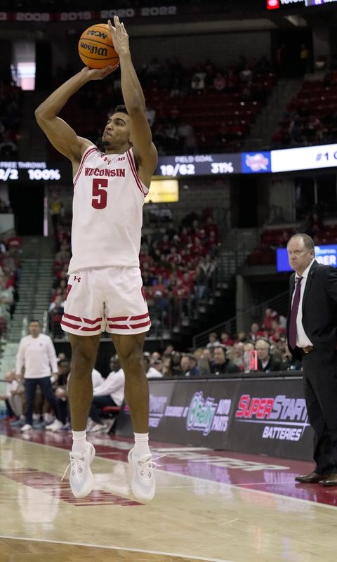 Wisconsin guard Daniel Freitag (5) attempts a three-point basket during the second half of their game Sunday, December 22, 2024 at the Kohl Center in Madison, Wisconsin. Wisconsin beat Detroit Mercy 76-53.