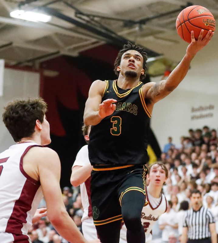 Green Bay native Amari Allen, shown going for a layup for Ashwaubenon in a game against De Pere in 2025, is a potential first-round NBA draft pick after one season at Alabama.