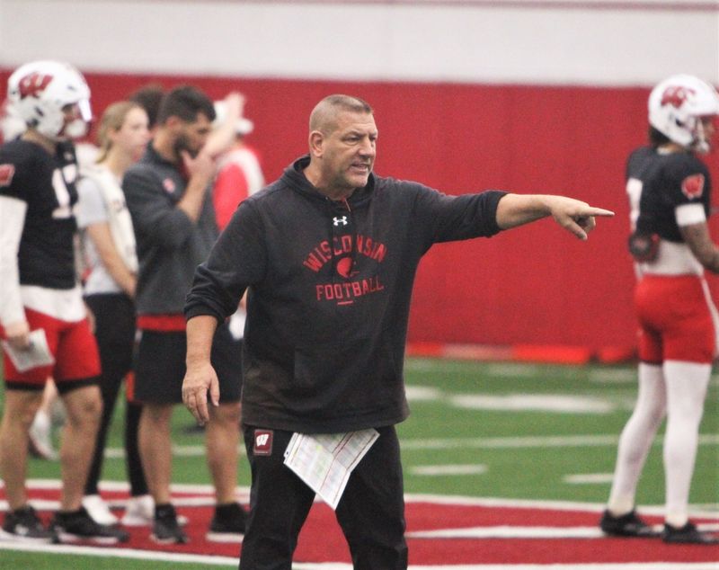Wisconsin offensive coordinator Phil Longo works with the team's quarterbacks during practice on Tuesday April 9, 2024 at the McClain Center in Madison, Wisconsin. Credit: Mark Stewart / Milwaukee Journal Sentinel-USA TODAY NETWORK