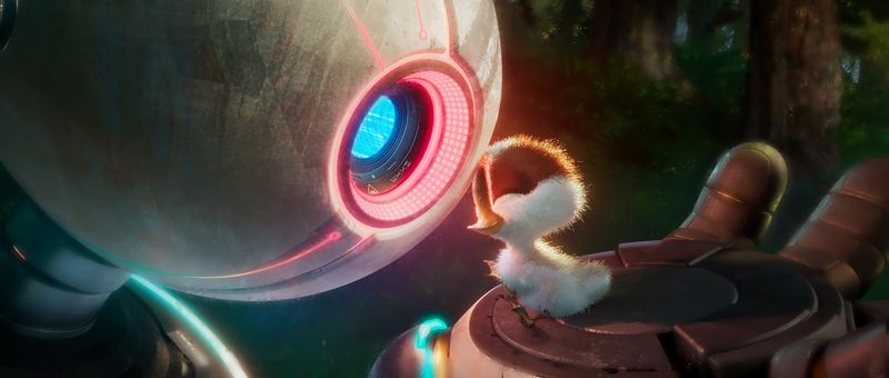 Maternal robot Roz (voiced by Lupita Nyong'o, left) adopts little gosling Brightbill (Kit Connor) in "The Wild Robot."
