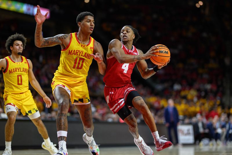 Jan 29, 2025; College Park, Maryland, USA; Wisconsin Badgers guard Kamari McGee (4) drives to the basket against Maryland Terrapins forward Julian Reese (10) during the first half at Xfinity Center. Mandatory Credit: Reggie Hildred-Imagn Images