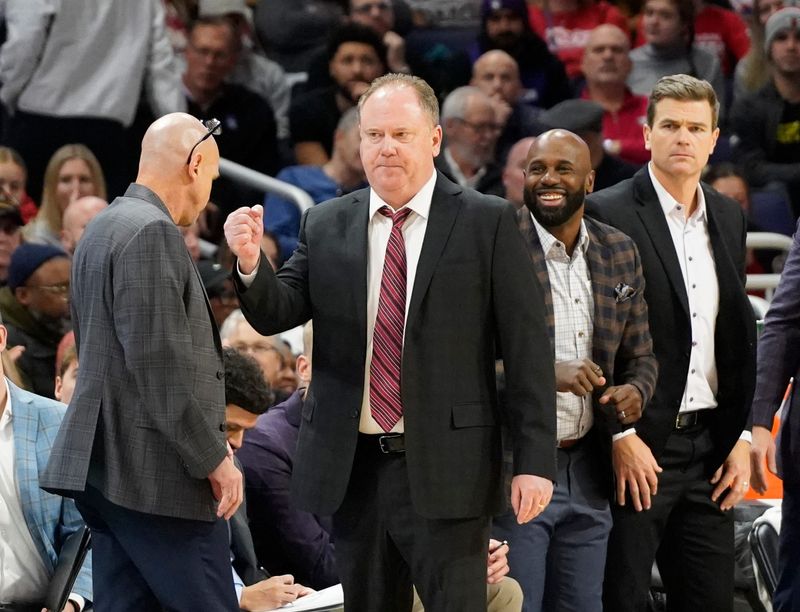 Feb 1, 2025; Evanston, Illinois, USA; Wisconsin Badgers head coach Greg Gard gestures to his team in a game against the Northwestern Wildcats during the first half at Welsh-Ryan Arena. Mandatory Credit: David Banks-Imagn Images