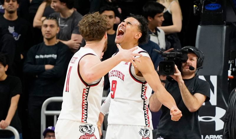 Feb 1, 2025; Evanston, Illinois, USA; Wisconsin Badgers guard John Tonje (9) and guard Max Klesmit (11) celebrate their win against the Northwestern Wildcats during the second half at Welsh-Ryan Arena. Mandatory Credit: David Banks-Imagn Images