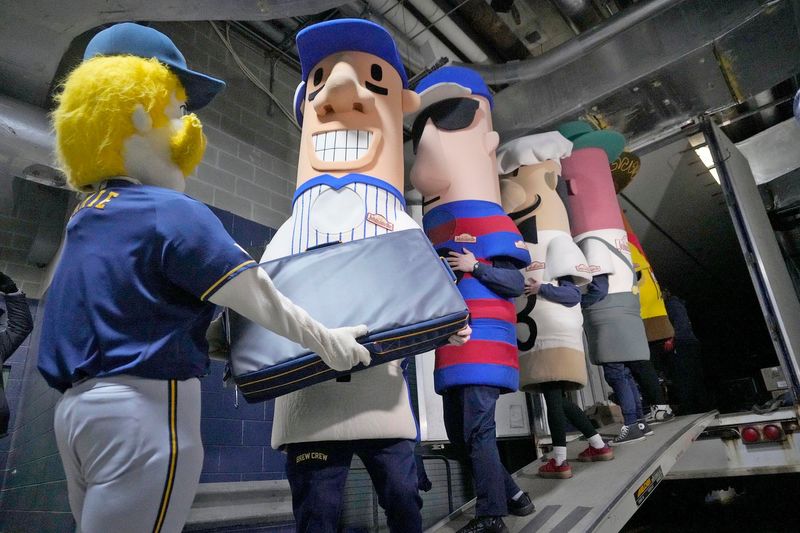 Bernie Brewer and the Famous Racing Sausages, help load the Milwaukee Brewers team equipment truck at American Family Field in Milwaukee on Tuesday, Feb. 4, 2025, before heading off to spring training in Phoenix, Arizona. Pitchers and catchers are scheduled to report to Phoenix on Wednesday, February 12.