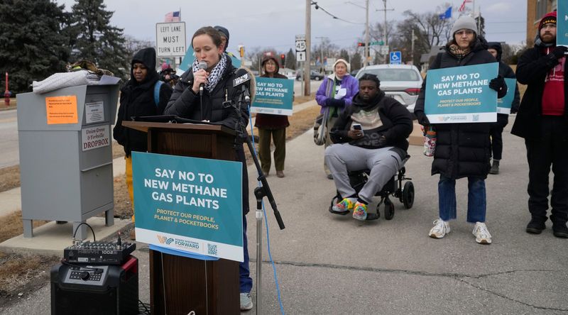 Dr. Brittany Keyes from Healthy Climate Wisconsin, speaks at a rally against the proposal of a new $300 million We Energies natural-gas plant in the Town of Paris , prior to the start of a public hearing in Union Grove, February. 5, 2025 at the Municipal Center Community Room. "Burning fossil fuel pollutes our air, lungs and our environment," said Keyes.
