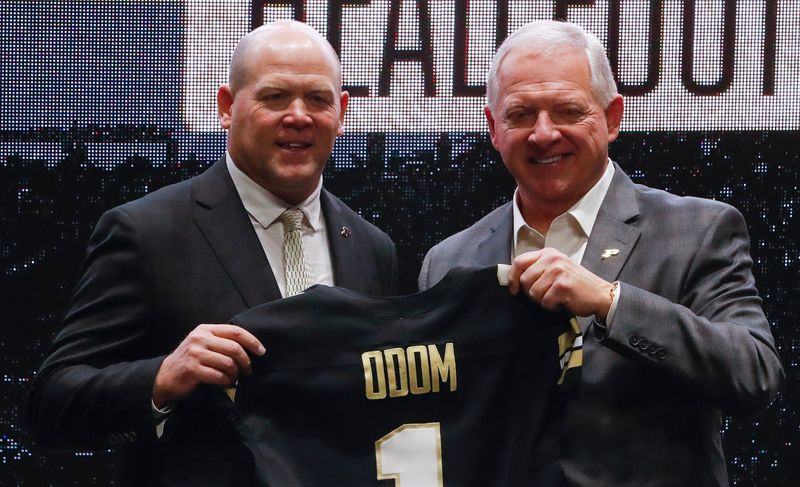 Purdue football head coach Barry Odom and Purdue athletic director Mike Bobinski pose for a photo Tuesday, Dec. 10, 2024, during the welcoming of Odom at Mackey Arena in West Lafayette, Ind.