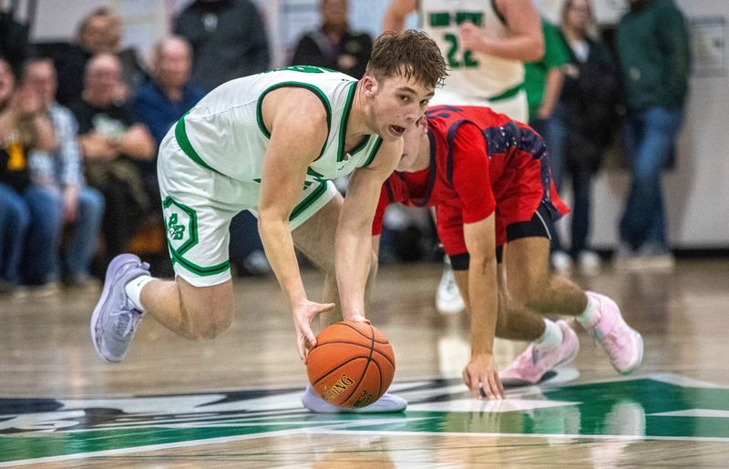 Almond-Bancroft junior Davis Dernbach (10) recovers the ball during the second half of the conference game against Pacelli at Almond-Bancroft High School in Almond, Wis. on Friday, Feb 7, 2025. Almond-Bancroft won 69-59.