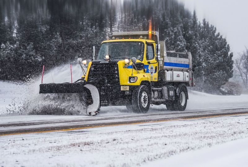 A Waukesha County snow plow clears Pewaukee Road in the City of Pewaukee on Wednesday, Feb. 12, 2025. A Winter Storm Warning is currently in effect for the following counties: Kenosha, Racine, Ozaukee, Sheboygan, Milwaukee and Waukesha counties, and expected to persist through 3:00 a.m. CST on Thursday, Feb. 13, 2025.