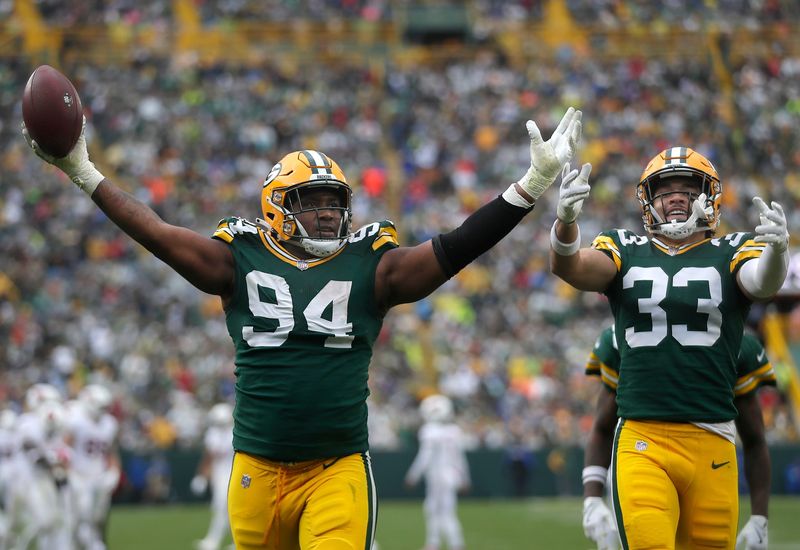 Green Bay Packers defensive end Karl Brooks (94), along with safety Evan Williams (33), celebrates after recovering a fumble against the Arizona Cardinals on Sunday, October 13, 2024 at Lambeau Field in Green Bay, Wis. The Packers defeated the Cardinals 34-13.
Wm. Glasheen USA TODAY NETWORK-Wisconsin