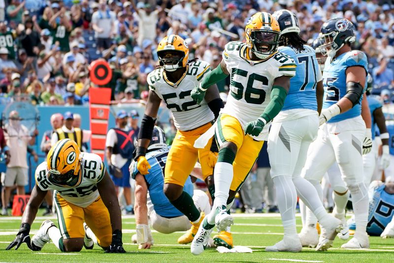 Green Bay Packers linebacker Edgerrin Cooper (56) celebrates sacking Tennessee Titans quarterback Will Levis (8) during the fourth quarter at Nissan Stadium in Nashville, Tenn., Sunday, Sept. 22, 2024.