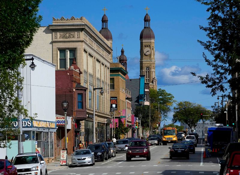 Traffic moves along the 800 block of West Historic Mitchell Street in Milwaukee on Thursday, Sept. 22, 2022. As Milwaukee studies closing Brady Street to cars, it might consider lessons from another well-known local street closing which failed. The former Mitchell Street pedestrian mall shut down roughly six blocks of the street to cars from 1975 to 1995, when it was removed.