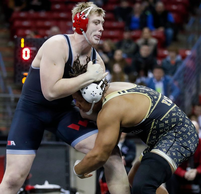 Wisconsin Rapids Lincoln High School's Tanner Gormanson wrestles against Brown Deer/Messmer/Shorewood's Makhi Rodgers in the Division 1 285-pound championship match during the WIAA state individual wrestling tournament on Saturday, March 1, 2025, at the Kohl Center in Madison, Wis. 
Tork Mason/USA TODAY NETWORK-Wisconsin