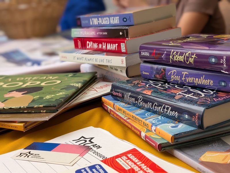 A stack of books that are commonly removed from school libraries sits on a vendor table at the 2025 inaugural Literary Day on the Hill, on March 4, 2025.