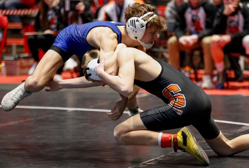 Stratford High School’s Kolton Haupt takes a shot against Mineral Point High School’s Memphis Burkhalter in a 106-pound match during a Division 3 semifinal dual in the WIAA state team wrestling tournament on Saturday, March 8, 2025, at the Wisconsin Field House in Madison, Wis.
Tork Mason/USA TODAY NETWORK-Wisconsin
