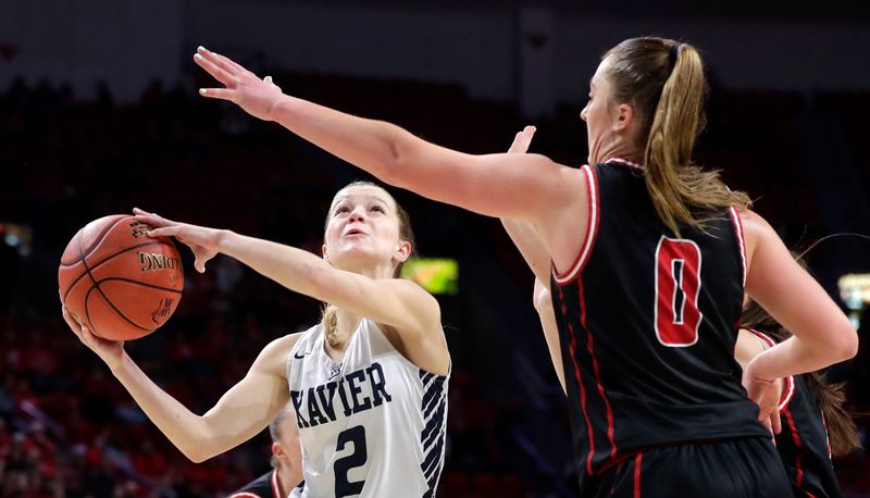 Xavier's Hailey Hafner (2) puts up a shot against Oostburg during the WIAA Division 3 girls basketball state championship game March 15 in Ashwaubenon.