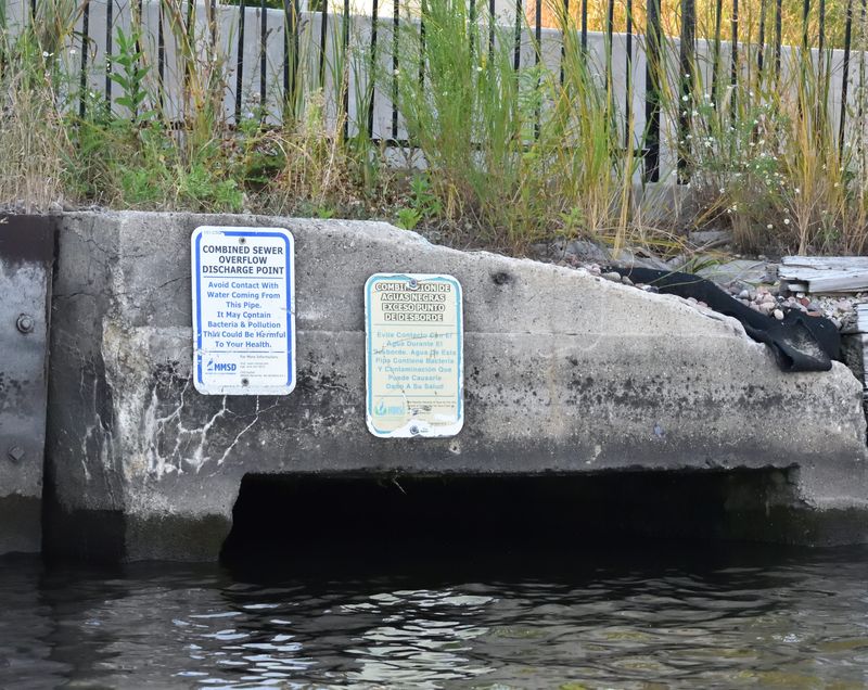 A combined sewer over flow discharge point along the Kinnickinnic River in Milwaukee. Milwaukee's combined sewage system carries both stormwater and wastewater through the same pipes. During heavy rains, if water reclamation facilities and tunnels reach capacity, the Milwaukee Metropolitan Sewerage District must discharge untreated water into the rivers and Lake Michigan to prevent backups into homes and businesses.