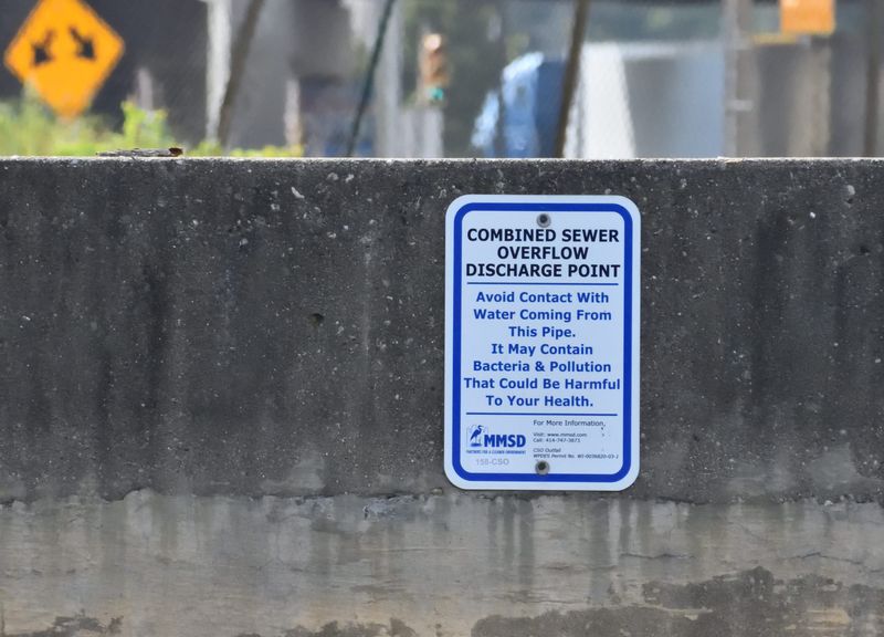 Here is a combined sewer overflow discharge point along the Kinnickinnic River in Milwaukee. Milwaukee's combined sewage system carries both stormwater and wastewater through the same pipes. During heavy rains, if water reclamation facilities and tunnels reach capacity, the Milwaukee Metropolitan Sewerage District must discharge untreated water into the rivers and Lake Michigan to prevent backups into homes and businesses.
