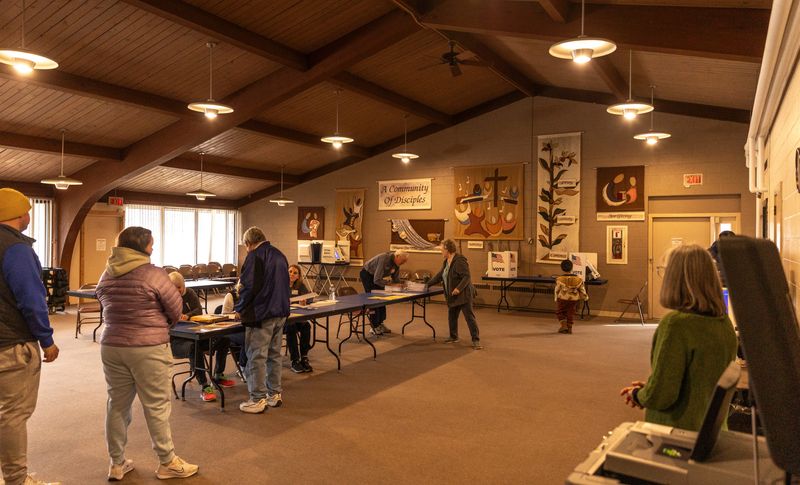 District 8 voters and spouses Andrew and Tami Meier vote at the polls in Saint Paul's United Methodist Church in Stevens Point, Wis. on Tuesday, April 1, 2025. At 3:45 pm, 619 ballots had been counted.