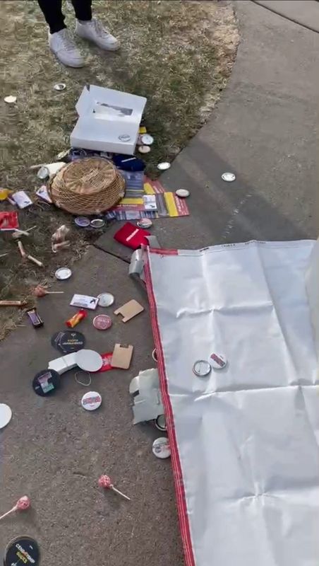 Campaign buttons and literature supporting conservative candidates was strewn all over the ground after a UW-Eau Claire professor flipped a table set up by the College Republicans chapter on Election Day.