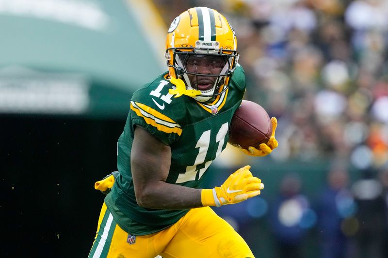 Jan 5, 2025; Green Bay, Wisconsin, USA; Green Bay Packers wide receiver Jayden Reed (11) during the game against the Chicago Bears at Lambeau Field. Mandatory Credit: Jeff Hanisch-Imagn Images