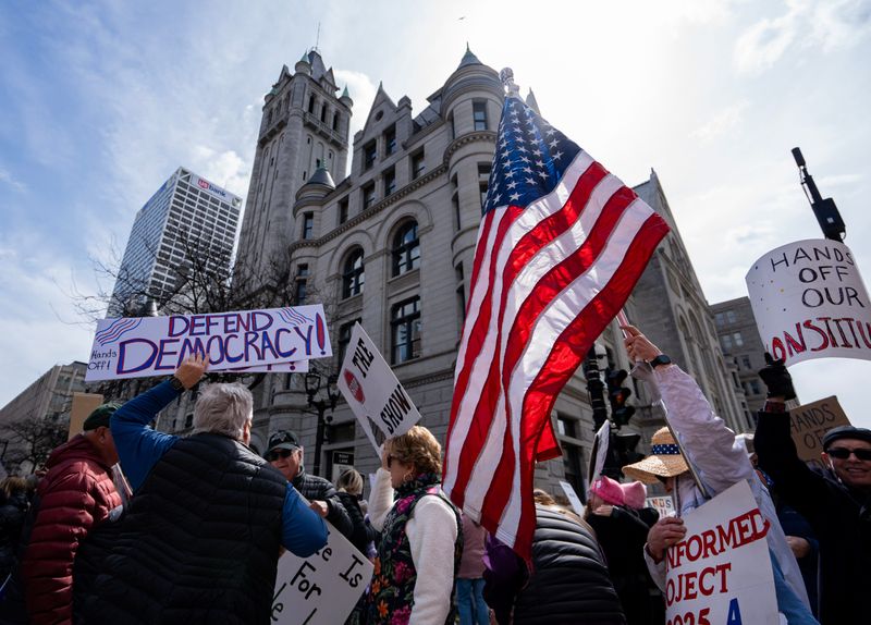 People protest outside of the Milwaukee Federal Building & U.S. Courthouse as part of the Hands Off! South-East Wisconsin Fights Back rally on Saturday April 5, 2025 in Milwaukee, Wis.

Jovanny Hernandez / Milwaukee Journal Sentinel