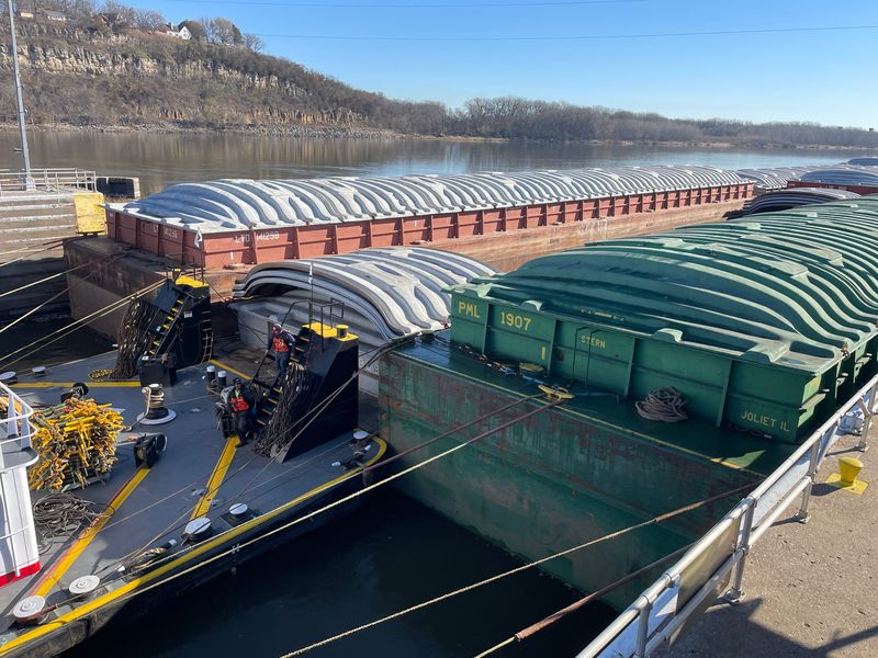 The Marquette Transportation towboat Angela K travels downstream through Lock and Dam No. 2 on November 15, 2023, along the Mississippi River in Hastings, Minnesota.
