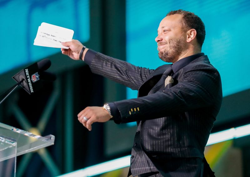 Miami Dolphins fullback Alec Ingold pumped up the crowd before announcing the team’s selection with the 37th overall pick during 2025 NFL Draft in April at Lambeau Field. He'll be at Bay Port High School in Suamico on July 12 to host a block party with his foundation.