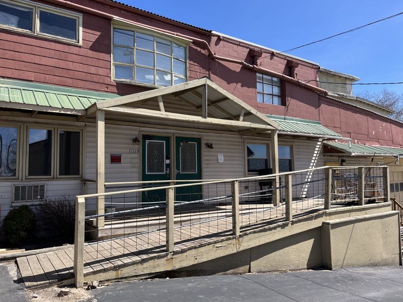 The former Sheboygan Area Pay It Forward day center's sign is gone at the EBCO Venture Center building, as seen, Wednesday, April 16, 2025, in Sheboygan, Wis.